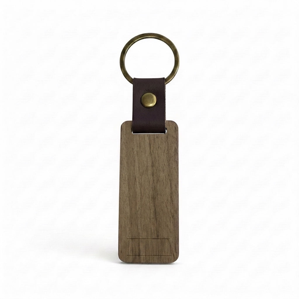 Porte-clé Atelier Shironeko en bois de noyer avec lanière en simili cuir et anneau en métal bronze vieilli